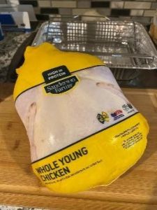 Fresh Whole Young Chicken in Food-Grade Packaging for Safe Cooking and Food Storage.