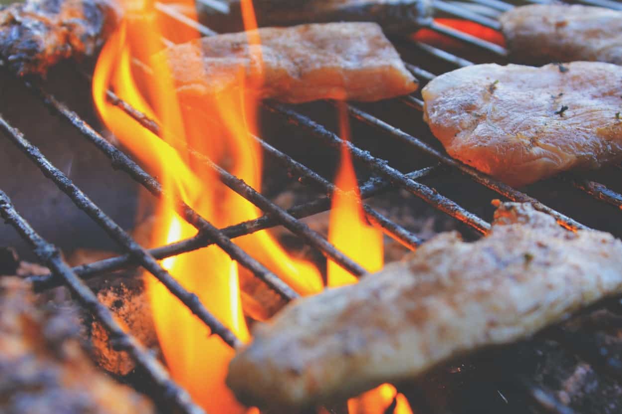 Grilling chicken on BBQ grill with flames, food preparation, outdoor cooking, Chef's Temp.