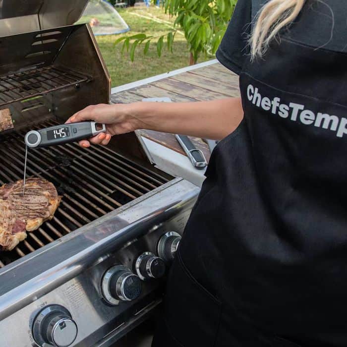 High-precision meat grill temperature measurement with ChefsTemp digital thermometer.