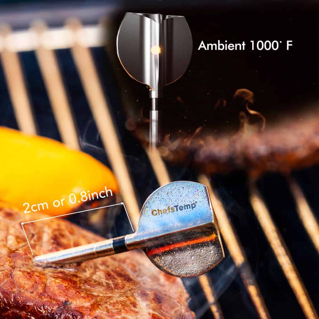 Thermometer measuring meat temperature on grill with ChefTemp device, ideal for precise cooking.