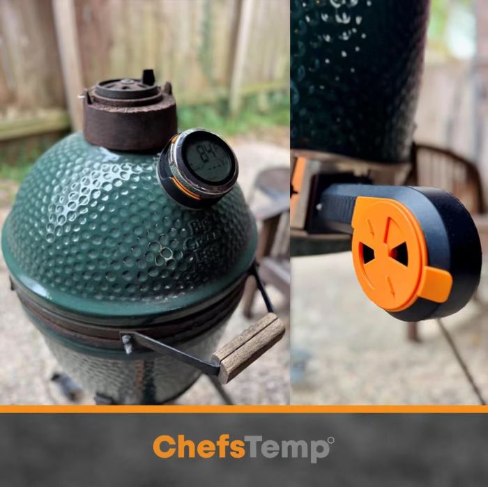 Wireless digital thermometer on a green ceramic grill for precise temperature monitoring.
